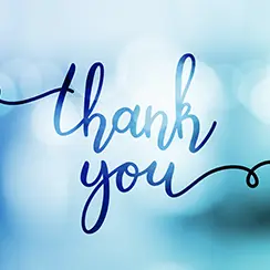 Elegant handwritten &lsquo;thank you&rsquo; text on a soft blue bokeh background.